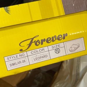 SOLD. Never worn. New in box. Leopard print slides.